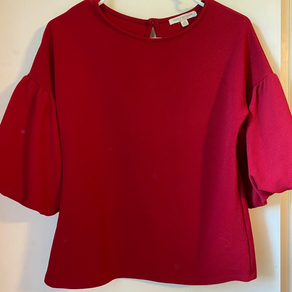 Red blouse with puffy sleeves